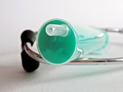 Syringe on stethoscope