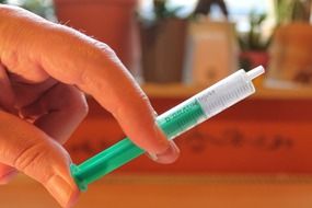 syringe in hand