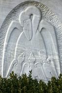 image of a bird stone relief