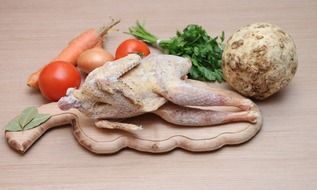 raw chicken and vegetables to make soup