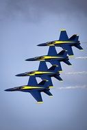 four blue angels in the sky