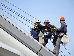 rappelling humans with a rope