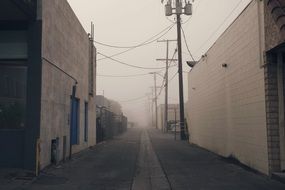 industrial alley with power lines