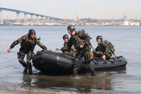 military training on teamwork work on the water