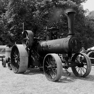 Grey photo of old tractor