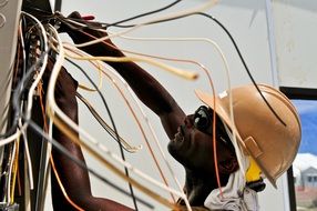 electrician working with electrical wires