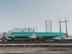 industrial airplane on train tracks