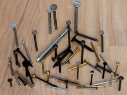 variety of nails on the board