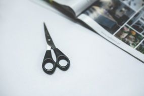 office scissors on a white table