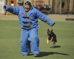 guard dog attacking uniformed man, training