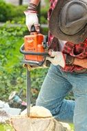 man working with wood