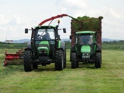 agricultural machinery on a green field