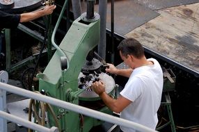 worker near a large machine tool in industry