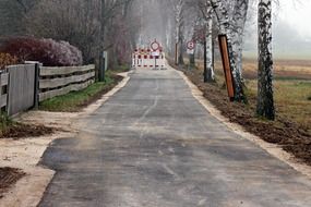 fencing of the road section for works