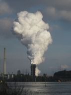 white smoke from industrial chimney