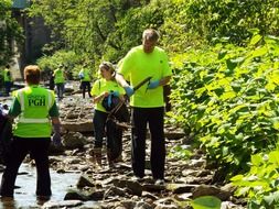 volunteers clean the creek