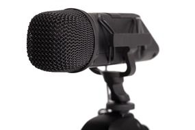 black mic recorder on a tripod