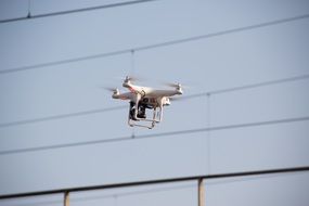 drone flies near the wall