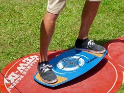 fitness, man feet balancing on board