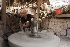 making a clay pot in Bhaktapur