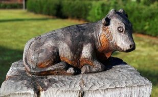 wood cow sculpture