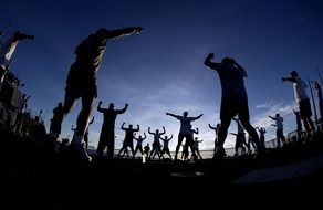 Sailors are doing exercises in morning