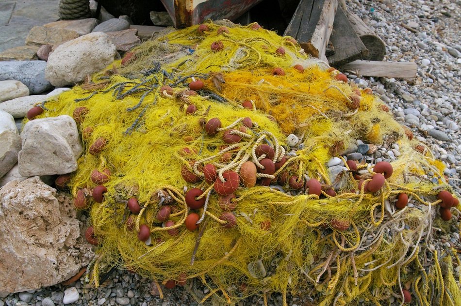 fishing net on the pebbles