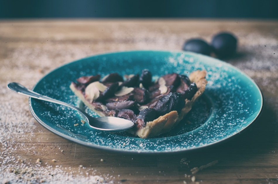 plum cake on a blue plate