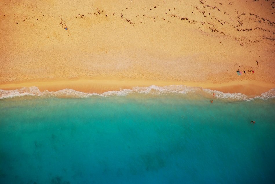 surfline, turquoise water and yellow sand