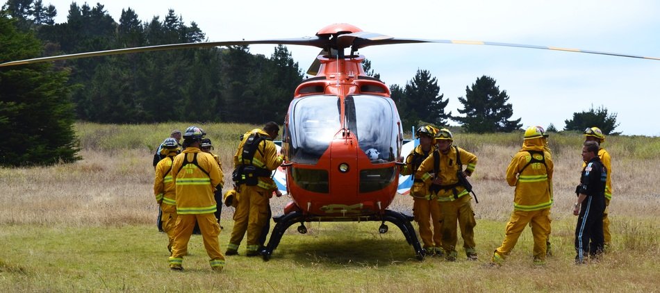 rescuers near the helicopter