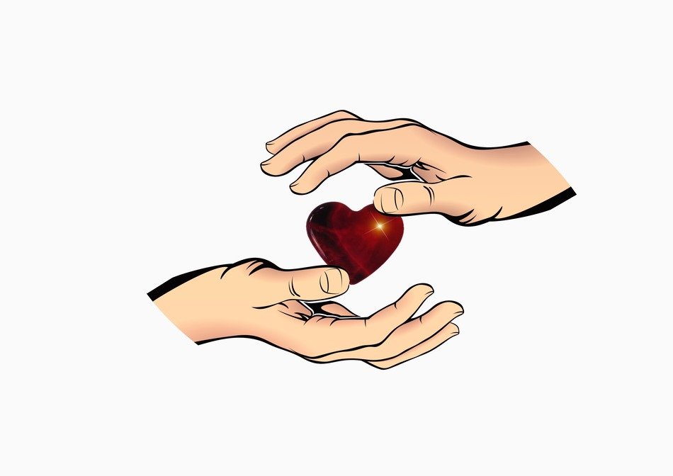 painted heart between the palms