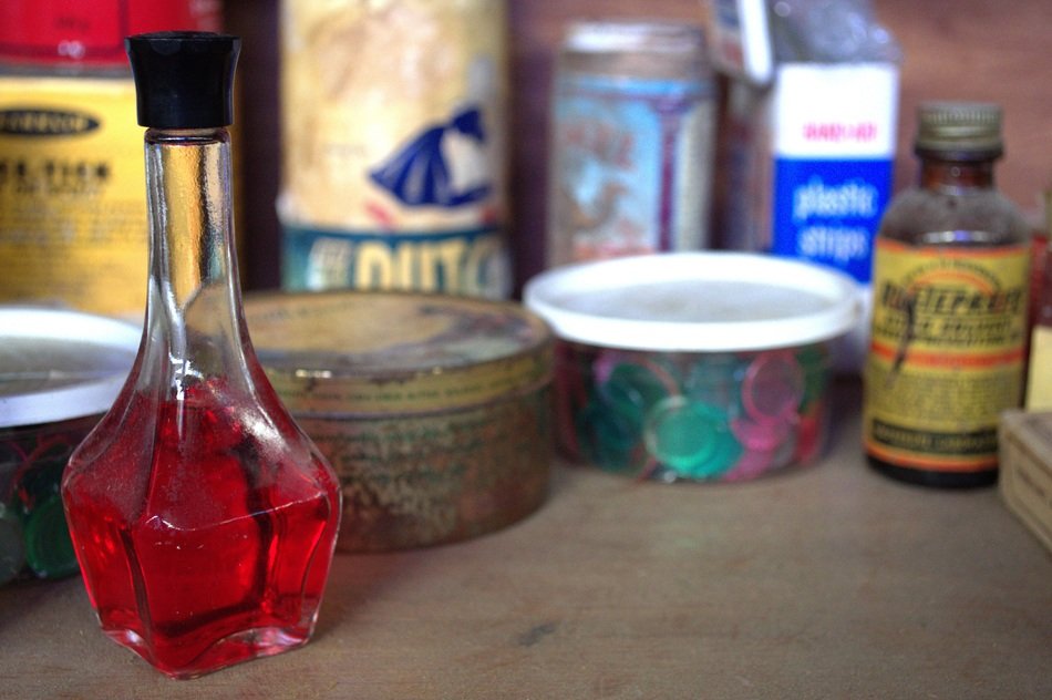 antique vintage medicine bottle and caps with creams