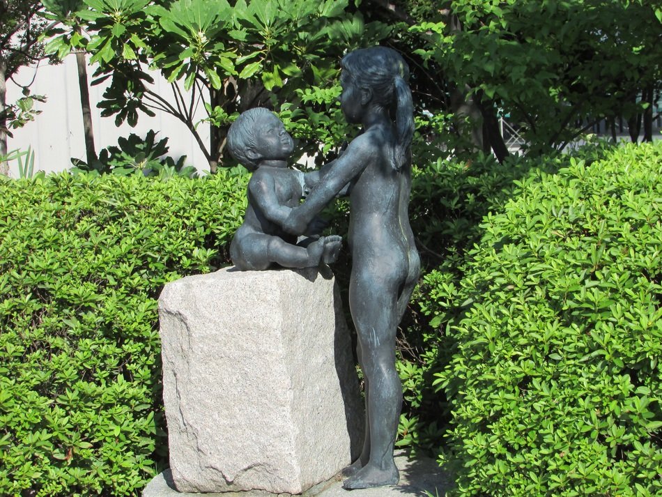 brothers stone sculpture