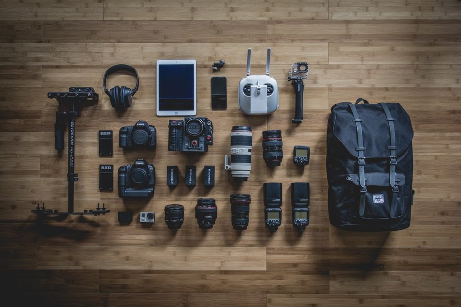 digital photography equipment on wooden surface