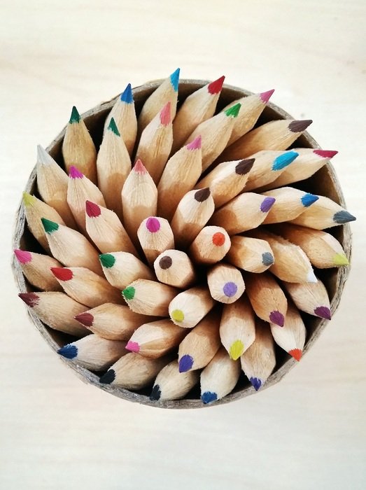many sharpened pencils in a glass
