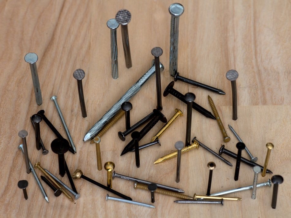 variety of nails on the board