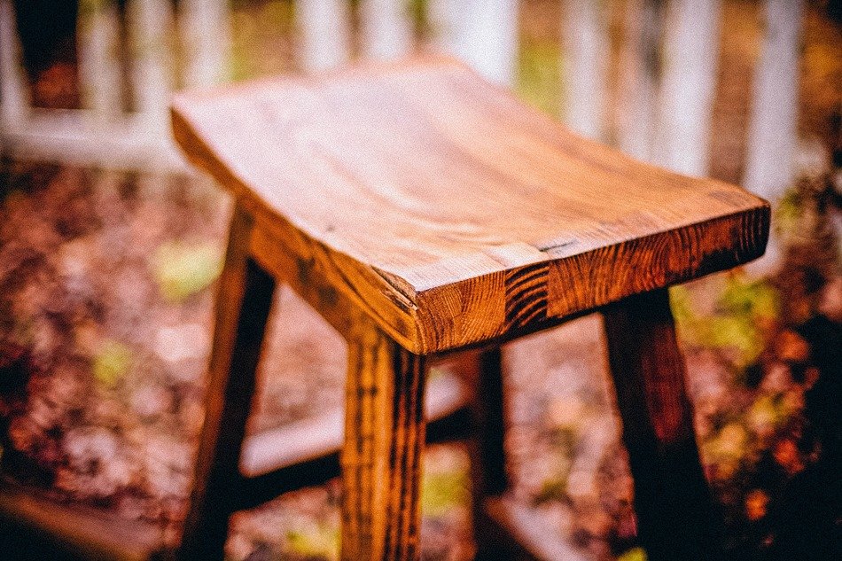 wooden chair varnished in the garden