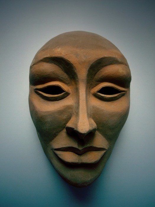 mystical female mask of ceramics
