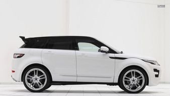 white Land Rover with dark glasses
