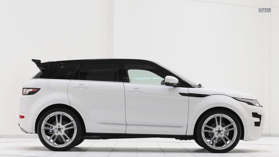 white Land Rover with dark glasses