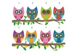 picture of colored owls on the branches