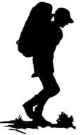 silhouette of a traveler with a backpack