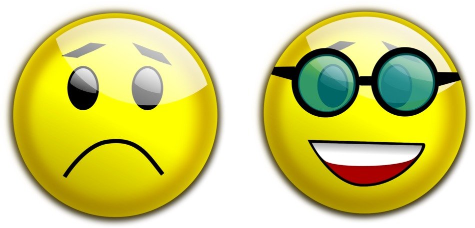 Sand and smiley face with the glasses clipart