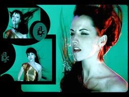 music video of the singer on the screen