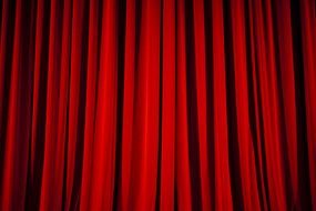 photo of a red theater curtain