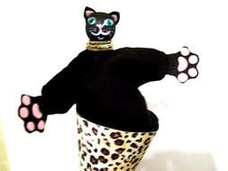 black cat, soft toy in bucket