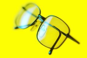 glasses on a yellow background as a picture for clipart