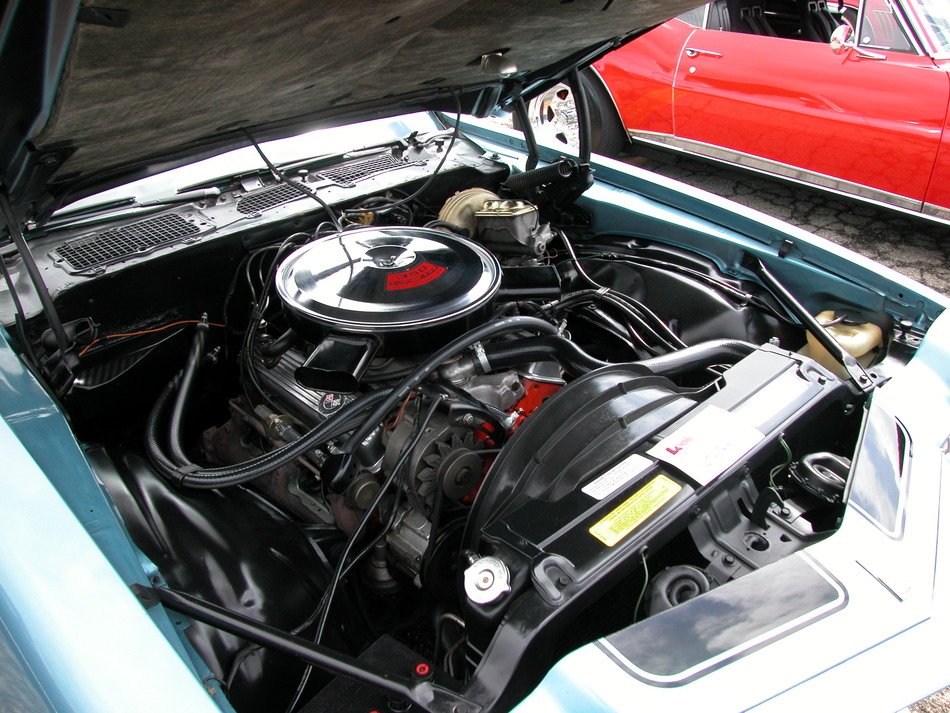 Chevrolet 350 with a raised hood