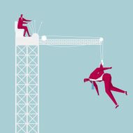 Crane lifting a businessman