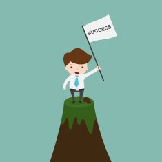 Businessman with flag standing on the top of a peak